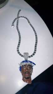 tennis chain with face pendant